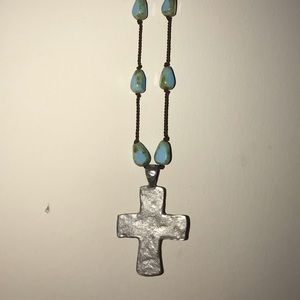 Metal cross and turquoise stone necklace